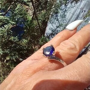 Video in listing. Women's marked 925 blue stone ring.